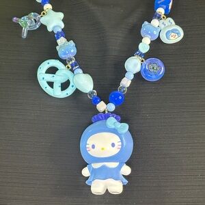 Cute Blue Beaded Necklace with Character Pendant